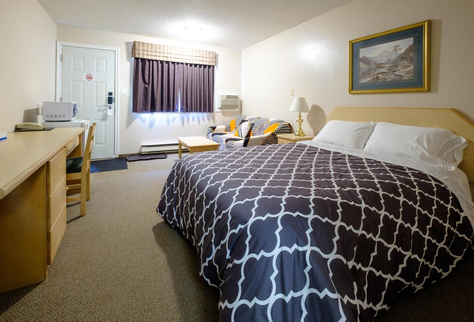 Weyburn Perfect Inns & Suites חדר תמונה